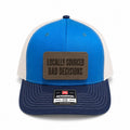 Locally Sourced Bad Decisions blue and white trucker hat