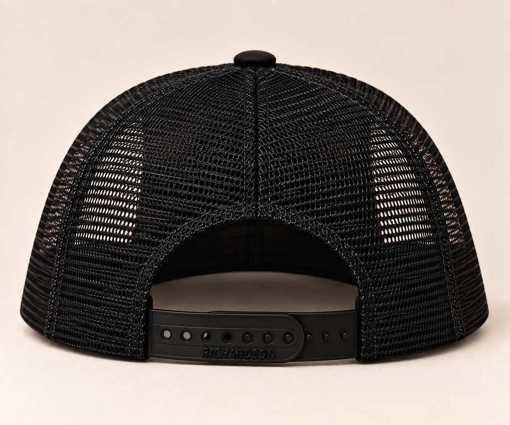 Black mesh trucker hat, rear snapback view with Richardson manufacturer mark