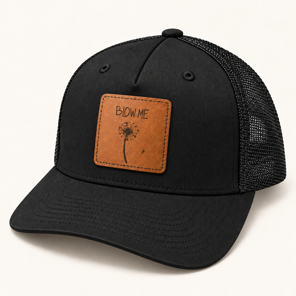 Blow Me Dandelion black trucker hat, three-quarter view