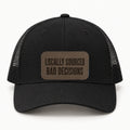 Locally Sourced Bad Decisions black trucker hat, front