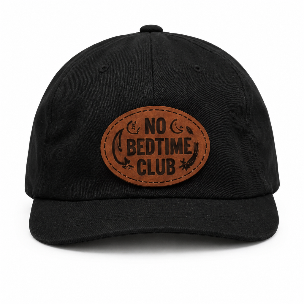 No Bedtime Club black baby hat with brown patch